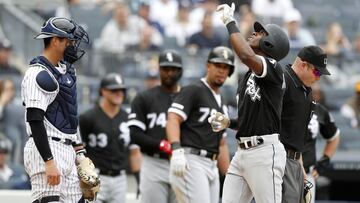 NEW YORK, NEW YORK - APRIL 14: Tim Anderson #7 of the Chicago White Sox celebrates his fourth inning grand slam home run with his teammates as Kyle Higashioka #66 of the New York Yankees looks on at Yankee Stadium on April 14, 2019 in the Bronx borough of New York City. (Photo by Jim McIsaac/Getty Images)