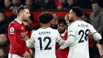 Soccer Football - Premier League - Manchester United v Leeds United - Old Trafford, Manchester, Britain - February 8, 2023 Manchester United's Luke Shaw clashes with Leeds United's Weston McKennie REUTERS/Peter Powell EDITORIAL USE ONLY. No use with unauthorized audio, video, data, fixture lists, club/league logos or 'live' services. Online in-match use limited to 75 images, no video emulation. No use in betting, games or single club /league/player publications. Please contact your account representative for further details.