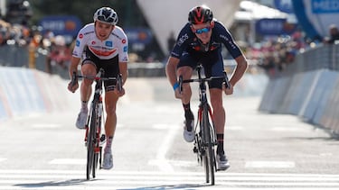 Team Ineos rider Great Britain's Tao Geoghegan Hart (R) sprints on his way to win ahead of Team Sunweb rider Australia's Jai Hindley new overall leader at the arrival of the 20th stage of the Giro d'Italia 2020 cycling race, a 198-kilometer route between