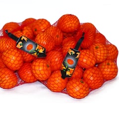Why are oranges and tangerines sold in a red mesh bag?