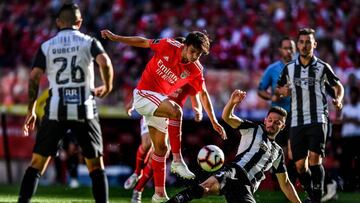 Benfica&#039;s Portuguese midfielder Joao Felix (2L) vies with Portimonense&#039;s Brazilian defender Lucas Possignolo (2R) during the Portuguese league football match between SL Benfica and Portimonense SC at the Luz stadium in Lisbon on May 4, 2019. (Ph