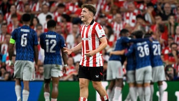 Athletic Bilbao's Spanish midfielder #18 Mikel Jauregizar Alboniga reacts after Arsenal's first goal during the UEFA Champions League first round day 1 football match between Athletic Club Bilbao and Arsenal at the San Mames stadium in Bilbao on September 16, 2025. (Photo by ANDER GILLENEA / AFP)