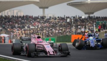 Esteban Ocón and Antonio Giovinazzi after an accident.