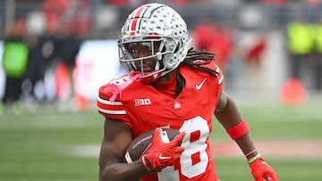 NFL Draft prospect Marvin Harrison Jr. shows the necklace he wears everywhere, which is meaningful to him because of his history with his father.