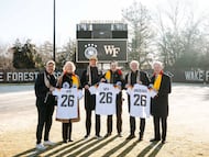 Dec 7, 2025; Winston-Salem, North Carolina, USA; Wake Forest University President Dr. Susan Wente, German head coach Julian Nagelsmann, Wake Forest University vice president and director of athletics John Currie, Director of the German national team Rudi Voller, and members of the German Football Association pose for a portrait at W. Dennie Spry Soccer Stadium. The German Football Association chose Wake Forest University as its Team Base Camp for FIFA World Cup 2026. Mandatory Credit: Wake Forest University via Imagn Images