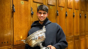 In this handout photograph released by French Tennis Federation (FFT) on June 9, 2025, Spain's Carlos Alcaraz poses with the trophy in the locker room, after victory in the men's singles final match against Italy's Jannik Sinner on day 15 of the French Open tennis tournament at the Roland-Garros Complex in Paris on June 8, 2025. After producing one of the greatest Grand Slam finals of all time, Carlos Alcaraz and Jannik Sinner served an explicit reminder they are the two main forces set to reign in men's tennis for years to come.
In the first French Open final in more than three decades between two players aged 23 or under, Alcaraz and Sinner delivered undoubtedly the most electrifying chapter in an increasingly captivating rivalry. It was the first time the pair had met in a Grand Slam final and it didn't disappoint, with twists and turns, high drama and outrageous shot-making from start to finish. (Photo by Cl?ment MAHOUDEAU / French Tennis Federation -FFT / AFP) / RESTRICTED TO EDITORIAL USE - MANDATORY CREDIT "AFP PHOTO / FRENCH TENNIS FEDERATION - FFT ROLAND GARROS 2025/ CLEMENT MAHOUDEAU" - HANDOUT - NO MARKETING NO ADVERTISING CAMPAIGNS - DISTRIBUTED AS A SERVICE TO CLIENTS