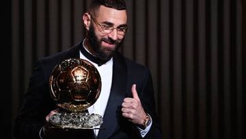 Real Madrid's French forward Karim Benzema receives the Ballon d'Or award during the 2022 Ballon d'Or France Football award ceremony at the Theatre du Chatelet in Paris on October 17, 2022. (Photo by FRANCK FIFE / AFP) (Photo by FRANCK FIFE/AFP via Getty Images)