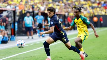 Ecuador's forward #16 Jeremy Sarmiento and Jamaica's defender #02 Dexter Lembikisa vie for the ball during the Conmebol 2024 Copa America tournament group B football match between Ecuador and Jamaica at Allegiant Stadium in Las Vegas, Nevada, on June 26, 2024. (Photo by Chris CODUTO / AFP)