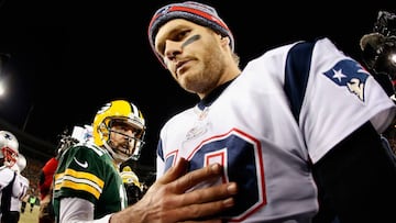 GREEN BAY, WI - NOVEMBER 30: Quarterback Tom Brady #12 of the New England Patriots walks away from Aaron Rodgers #12 of the Green Bay Packers after shaking hands following the NFL game at Lambeau Field on November 30, 2014 in Green Bay, Wisconsin. The Packers defeated the Patriots 26-21. (Photo by Christian Petersen/Getty Images)