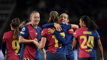 Barcelona's Spanish midfielder #14 Aitana Bonmati celebrates with teammates scoring her team's second goal during the UEFA Women's Champions League preliminary round group D football match between FC Barcelona and Manchester City FC at the Estadi Olimpic Lluis Companys in Barcelona on December 18, 2024. (Photo by Josep LAGO / AFP)