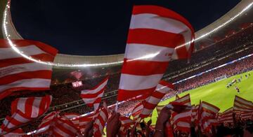 Atletico de Madrid fans wave flags at Estadio Wanda Metropolitano grandstands prior to start the La Liga match between Club Atletico Madrid and Malaga CF on September 16, 2017 in Madrid, Spain.