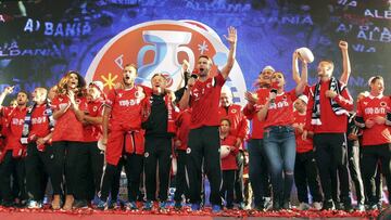 Albanian national soccer players celebrate in Tirana, Albania, October 12, 2015. Albania qualified for Euro 2016, their first ever major tournament, when a 3-0 away win over Armenia clinched second place in Group I above Denmark on Sunday sparking wild ce