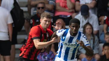 BOURNEMOUTH, ENGLAND - JULY 30: Bournemouth's Chris Mepham (left) battles with Real Sociedad's Mohamed-Ali Cho (right) during the Football Friendly match between Bournemouth and Real Sociedad at Vitality Stadium on July 30, 2022 in Bournemouth, England. (Photo by David Horton - CameraSport via Getty Images)