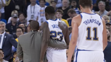 October 27, 2017; Oakland, CA, USA; Golden State Warriors forward Draymond Green (23) is escorted by a team security guard after a fight with Washington Wizards guard Bradley Beal (3, not pictured) during the second quarter at Oracle Arena. Mandatory Credit: Kyle Terada-USA TODAY Sports