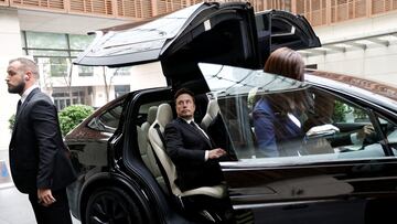 Tesla Chief Executive Officer Elon Musk gets in a Tesla car as he leaves a hotel in Beijing, China May 31, 2023. REUTERS/Tingshu Wang     TPX IMAGES OF THE DAY