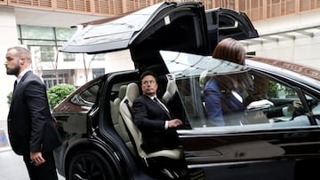 Tesla Chief Executive Officer Elon Musk gets in a Tesla car as he leaves a hotel in Beijing, China May 31, 2023. REUTERS/Tingshu Wang TPX IMAGES OF THE DAY