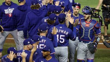 PHOENIX, ARIZONA - OCTOBER 30: The Texas Rangers celebrate after beating the Arizona Diamondbacks 3-1 in Game Three of the World Series at Chase Field on October 30, 2023 in Phoenix, Arizona.   Jamie Squire/Getty Images/AFP (Photo by JAMIE SQUIRE / GETTY IMAGES NORTH AMERICA / Getty Images via AFP)