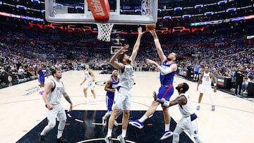 vica Zubac #40 of the LA Clippers takes a shot against Maxi Kleber #42 of the Dallas Mavericks in the second half during game one of the Western Conference First Round Playoffs at Crypto.com Arena on April 21, 2024 in Los Angeles, California.