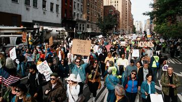 People attend a "No Kings" protest against U.S. President Donald Trump's policies, in New York City, U.S., October 18, 2025. REUTERS/Eduardo Munoz
