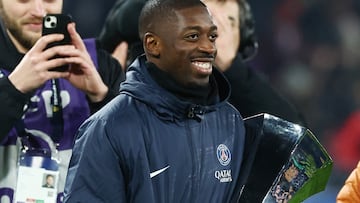 Soccer Football - Trophee des Champions - Paris St Germain v Toulouse - Parc des Princes, Paris, France - January 3, 2024 Paris St Germain's Ousmane Dembele celebrates winning the Trophee des Champions with the trophy REUTERS/Stephanie Lecocq