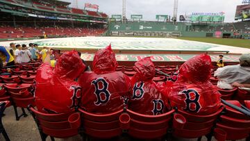 BOSTON, MASSACHUSETTS - JUNE 14: Boston Red Sox fans take a picture during a rain delay before a game between the Boston Red Sox and the Colorado Rockies at Fenway Park on June 14, 2023 in Boston, Massachusetts.   Paul Rutherford/Getty Images/AFP (Photo by Paul Rutherford / GETTY IMAGES NORTH AMERICA / Getty Images via AFP)