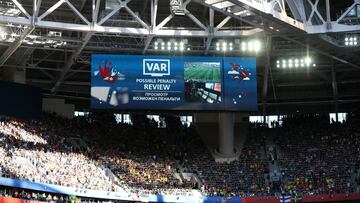 SAINT PETERSBURG, RUSSIA - JULY 03: The big screen inside the stadium shows VAR in use for a penalty review during the 2018 FIFA World Cup Russia Round of 16 match between Sweden and Switzerland at Saint Petersburg Stadium on July 3, 2018 in Saint Petersburg, Russia. (Photo by Francois Nel/Getty Images)