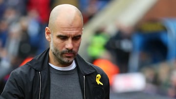 Man City's Guardiola fined by FA over yellow ribbon protest