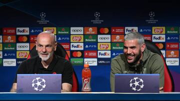 CAIRATE, ITALY - APRIL 11: Head coach AC Milan Stefano Pioli and Theo Hernandez of AC Milan speak with the media during press conference ahead of their UEFA Champions League quarterfinal first leg match against SSC Napoli at Milanello on April 11, 2023 in Cairate, Italy. (Photo by Claudio Villa/AC Milan via Getty Images)