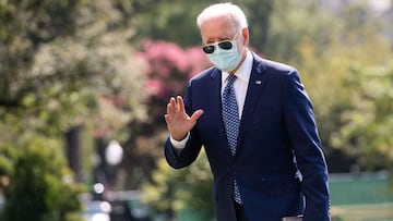 US President Joe Biden walks across the South Lawn of the White House in Washington, DC, September 20, 2021, after returning on Marine One from a weekend at his house in Rehoboth Beach, Delaware.