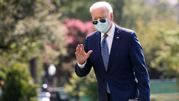 US President Joe Biden walks across the South Lawn of the White House in Washington, DC, September 20, 2021, after returning on Marine One from a weekend at his house in Rehoboth Beach, Delaware. 