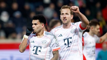 Soccer Football - Bundesliga - 1. FC Heidenheim v Bayern Munich - Voith-Arena, Heidenheim, Germany - December 21, 2025 Bayern Munich's Luis Diaz celebrates scoring their third goal with Harry Kane REUTERS/Heiko Becker DFL REGULATIONS PROHIBIT ANY USE OF PHOTOGRAPHS AS IMAGE SEQUENCES AND/OR QUASI-VIDEO.