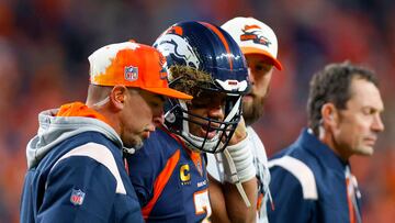 DENVER, COLORADO - DECEMBER 11: Russell Wilson #3 of the Denver Broncos walks off the field after sustaining a concussion in the fourth quarter of a game against the Kansas City Chiefs at Empower Field At Mile High on December 11, 2022 in Denver, Colorado. Justin Edmonds/Getty Images/AFP (Photo by Justin Edmonds / GETTY IMAGES NORTH AMERICA / Getty Images via AFP)