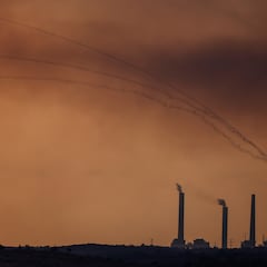 Missile strikes caught on camera during live interview in Gaza