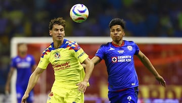 Igor Lichnovsky (L) of America fights for the ball with Angel Sepulveda (R) of Cruz Azul during the final second leg match between America and Cruz Azul as part of the Torneo Clausura 2024 Liga BBVA MX at Azteca Stadium on May 26, 2024 in Mexico City, Mexico.