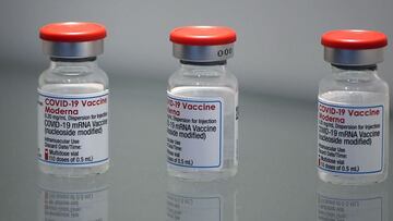 This picture taken in Monts, central France, on April 22, 2021, shows vials of the Moderna Covid-19 disease vaccine at Recipharm plant. - Recipharm has been chosen by the American biotech Moderna to produce part of its candidate vaccine against Covid-19 in France. (Photo by GUILLAUME SOUVANT / AFP)