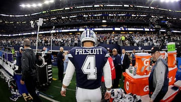 ARLINGTON, TEXAS - DECEMBER 30: Dak Prescott #4 of the Dallas Cowboys walks off the field after defeating the Detroit Lions in the game at AT&T Stadium on December 30, 2023 in Arlington, Texas.   Ron Jenkins/Getty Images/AFP (Photo by Ron Jenkins / GETTY IMAGES NORTH AMERICA / Getty Images via AFP)