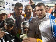 Photo during the celebration after the match Pumas UNAM vs Tigres UANL, corresponding to second leg match of the Great Final of Apertura 2015 League BBVA Bancomer MX at Olympic Universitary Stadium.
Foto durante la celebracion despues del partido Pumas UNAM vs Tigres UANL, correspondiente al partido de vuelta de la Gran Final del Torneo Apertura 2015 de la Liga BBVA Bancomer MX en el Estadio Olimpico Universitario, en la foto: Nahuel Guzman, Guido Pizarro y Andre-Pierre Gignac Jugadores de Tigres levantan el trofeo de campeon
13/12/2015/MEXSPORT/Jorge Martinez.
