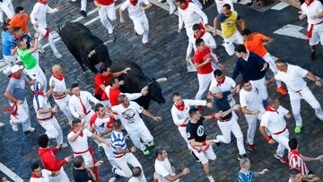 PAMPLONA, SPAIN - JULY 11: People are seen running at the fifth running of the bulls in San Ferm&Atilde;&shy;n on July 11, 2019 in Pamplona, Spain. (Photo by &Atilde;scar J.Barroso/Europa Press via Getty Images)  (Photo by Europa Press News/Europa Press via Getty Images )