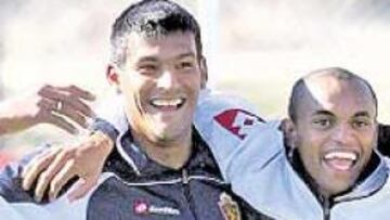 <b>SEGURIDAD. </b>Toledo y Ewerthon, en un momento del entrenamiento del Zaragoza de ayer.