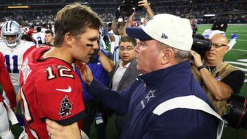 ARLINGTON, TEXAS - SEPTEMBER 11: Tom Brady #12 of the Tampa Bay Buccaneers talks with head coach Mike McCarthy of the Dallas Cowboys after the Buccaneers defeat the Cowboys 19-3 at AT&T Stadium on September 11, 2022 in Arlington, Texas.   Tom Pennington/Getty Images/AFP