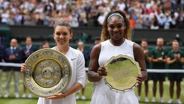 Romania&#039;s Simona Halep (L) poses with the Venus Rosewater Dish trophy (L) and US player Serena Williams poses with the runners up trophy after Halep won their women&#039;s singles final on day twelve of the 2019 Wimbledon Championships at The All England Lawn Tennis Club in Wimbledon, southwest London, on July 13, 2019. (Photo by Ben STANSALL / AFP) / RESTRICTED TO EDITORIAL USE