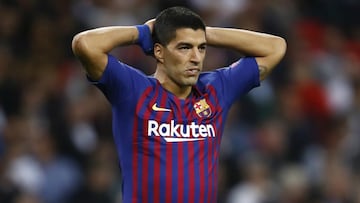 Barcelona's Suárez to have treatment on knee problem