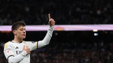 Real Madrid's Turkish midfielder #24 Arda Guler celebrates scoring his team's fourth goal during the Spanish league football match between Real Madrid CF and RC Celta de Vigo at the Santiago Bernabeu stadium in Madrid on March 10, 2024. (Photo by Pierre-Philippe MARCOU / AFP)
