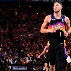 Booker plays down first triple-double after Suns take Game 1