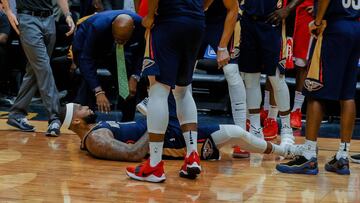 Jan 26, 2018; New Orleans, LA, USA; New Orleans Pelicans center DeMarcus Cousins (0) lays on the ground after suffering an apparent injury during the fourth quarter against the Houston Rockets at the Smoothie King Center. Pelicans defeated the Rockets 115-113. Mandatory Credit: Derick E. Hingle-USA TODAY Sports