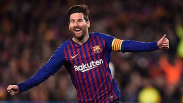 Barcelona&#039;s Argentinian forward Lionel Messi celebrates after scoring during the UEFA Champions League quarter-final second leg football match between Barcelona and Manchester United at the Camp Nou stadium in Barcelona on April 16, 2019. (Photo by J