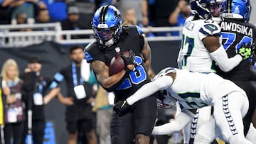 Sep 30, 2024; Detroit, Michigan, USA; Detroit Lions running back Jahmyr Gibbs (26) scores a touchdown against the Seattle Seahawks in the second quarter at Ford Field. Mandatory Credit: Eamon Horwedel-Imagn Images