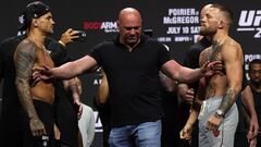 LAS VEGAS, NEVADA - JULY 09: Dustin Poirier and Conor McGregor pose during a ceremonial weigh in for UFC 264 at T-Mobile Arena on July 09, 2021 in Las Vegas, Nevada.   Stacy Revere/Getty Images/AFP
 == FOR NEWSPAPERS, INTERNET, TELCOS &amp; TELEVISION USE