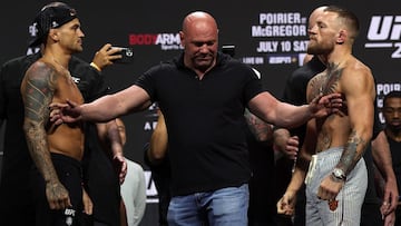 LAS VEGAS, NEVADA - JULY 09: Dustin Poirier and Conor McGregor pose during a ceremonial weigh in for UFC 264 at T-Mobile Arena on July 09, 2021 in Las Vegas, Nevada.   Stacy Revere/Getty Images/AFP
 == FOR NEWSPAPERS, INTERNET, TELCOS &amp; TELEVISION USE