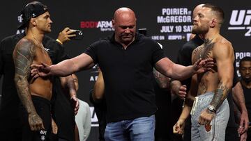 LAS VEGAS, NEVADA - JULY 09: Dustin Poirier and Conor McGregor pose during a ceremonial weigh in for UFC 264 at T-Mobile Arena on July 09, 2021 in Las Vegas, Nevada.   Stacy Revere/Getty Images/AFP
 == FOR NEWSPAPERS, INTERNET, TELCOS &amp; TELEVISION USE